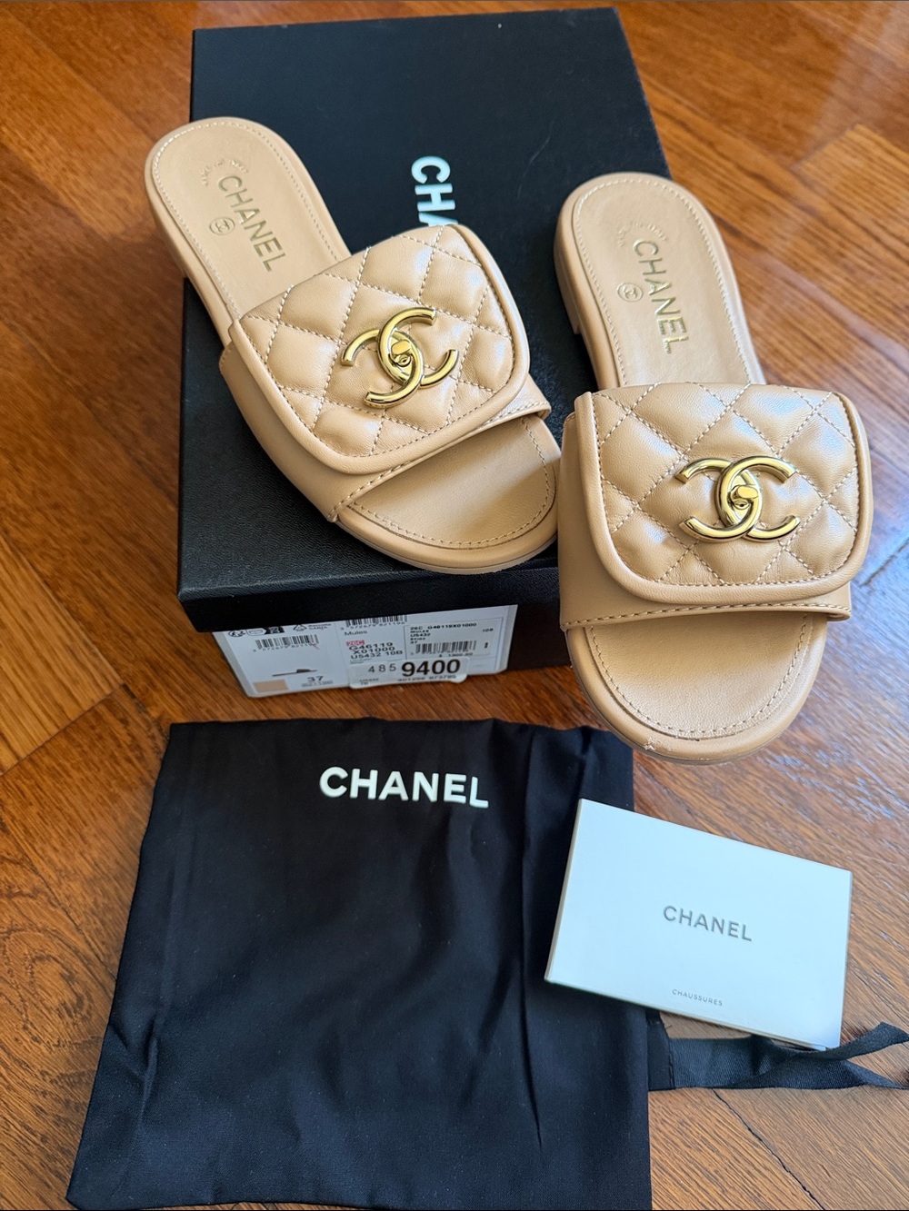 CHANEL Quilted Beige Slide Sandals with Gold CC Hardware